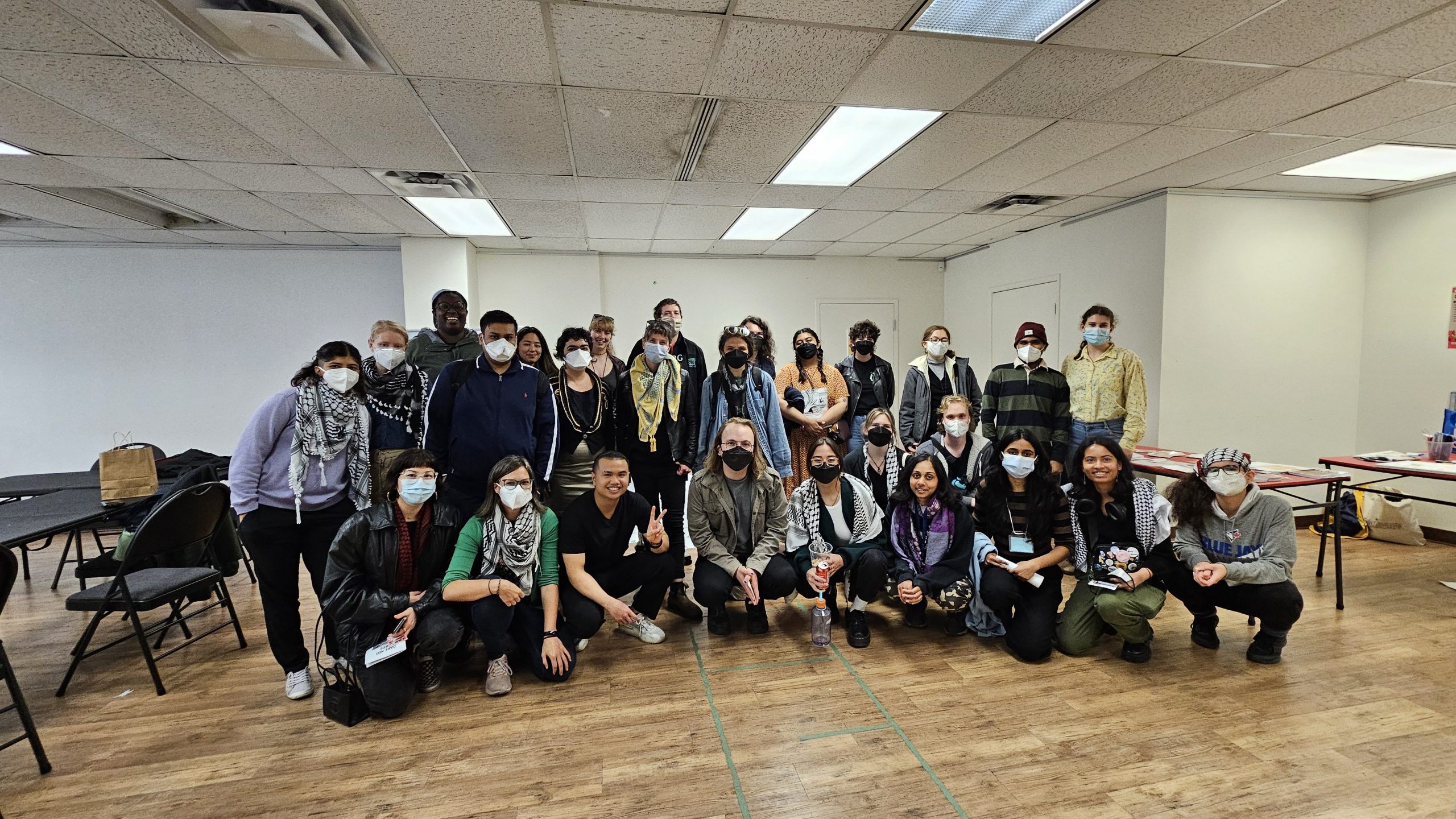 Group of people posing for a photo at the 2024 OPIRG Board Training School.